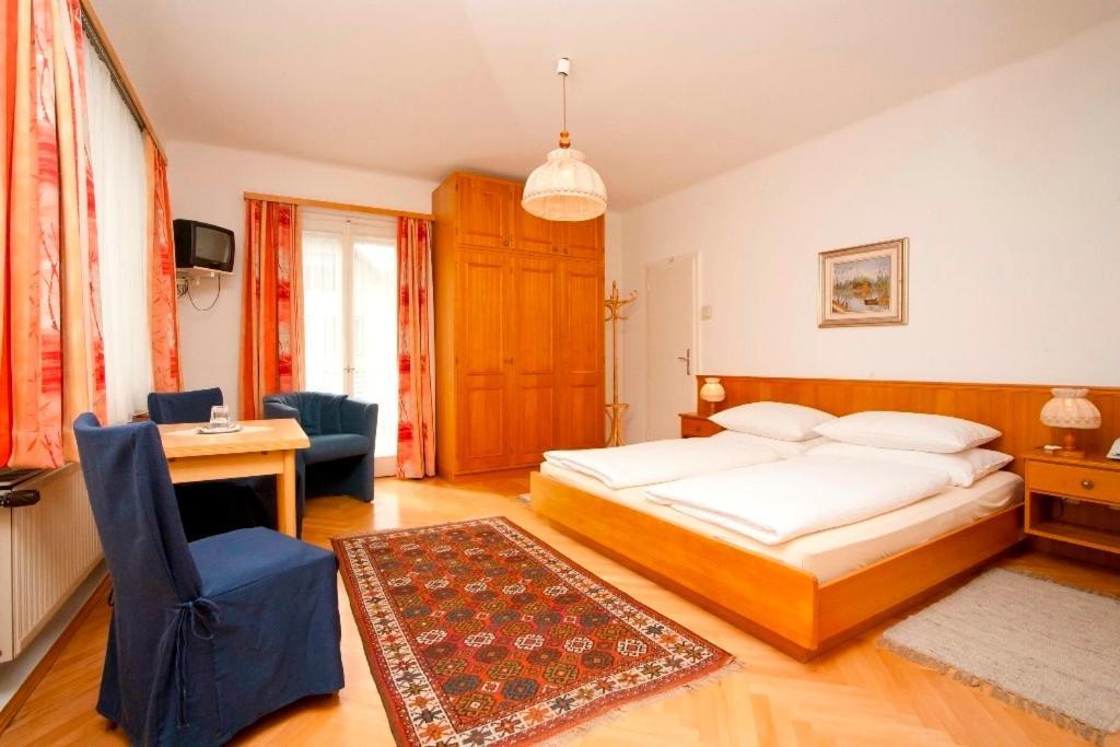 וולדן אם וורתרסי Hotel Velden Bacherlwirt חדר תמונה