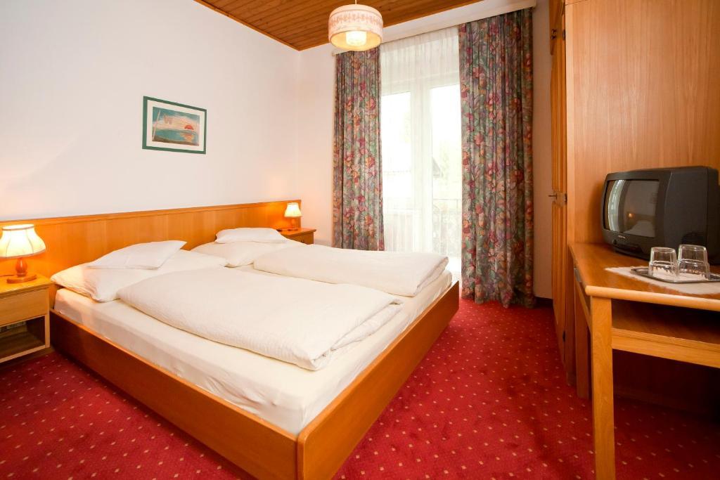 וולדן אם וורתרסי Hotel Velden Bacherlwirt חדר תמונה